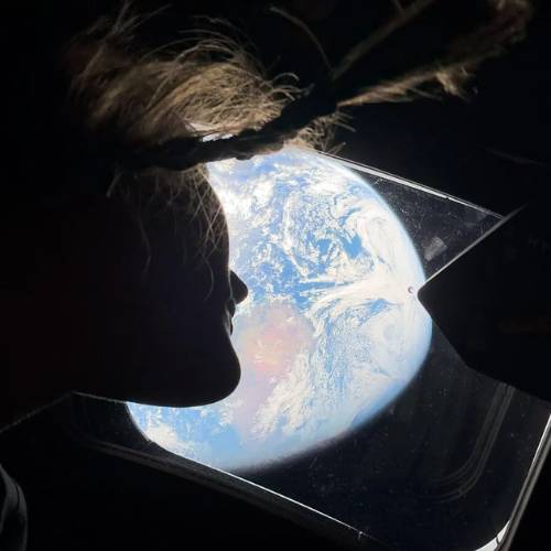 Christina Koch views Earth from Orion NASA astronaut and Artemis II mission specialist Christina Koch looks at Earth from the window of the Orion spacecraft on its way to the Moon during the Artemis II mission. At the time, Christina was already farther away than any woman has ever been from our planet. NASA