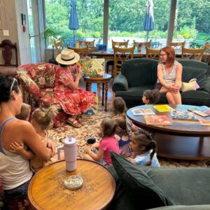 Children gathered for an indoor Storytime in Virginia’s House.